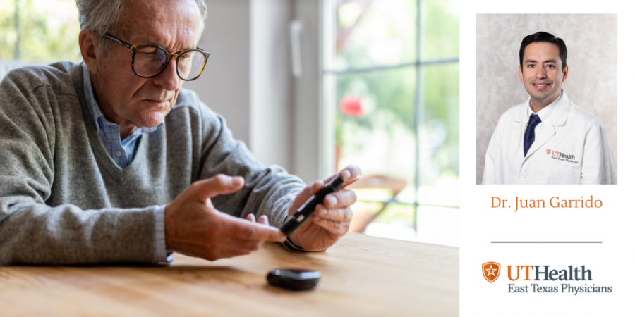 elderly man looking at his phone